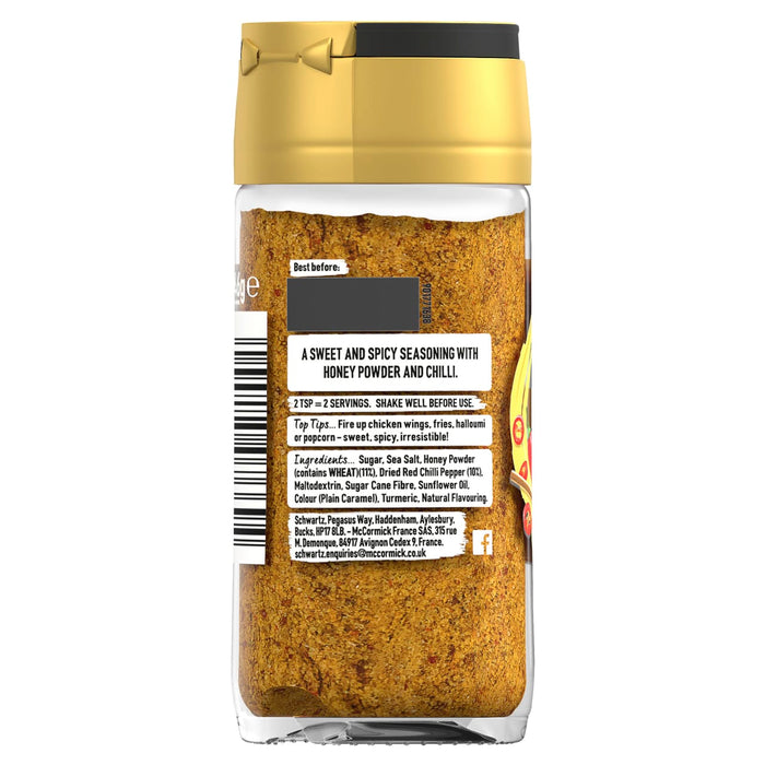 The back of a glass jar of Schwartz Sweet and Spicy Seasoning with Honey Powder and Chilli, part of the Jr Hot Honey Seas X6 product line, displays ingredients and usage tips.