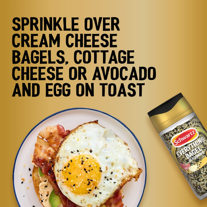 A bottle of Schwartz Jr Every Bagel Seas X6 is shown next to a plate of avocado and egg on toast with bacon to illustrate serving suggestions.