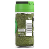 A clear glass jar of Schwartz Marjoram 8G filled with dried green herbs and featuring a white label with a barcode and recycling information.