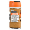 The back label of a jar of Schwartz Mixed Spice 28G displays the ingredients list including ground cinnamon, coriander, caraway seed, nutmeg, ginger, and cloves.