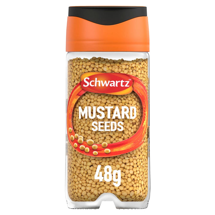 A clear glass Schwartz Mustard Seed 48G Jar with an orange and black lid filled with whole yellow mustard seeds.