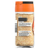 A clear glass jar of Schwartz Sesame Seeds, 43G, is shown from the back, displaying the label with serving suggestions and company details.