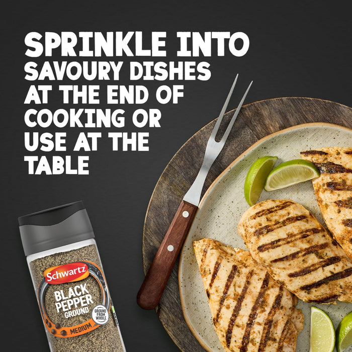 A jar of Schwartz Ground Black Pepper, 33G is shown next to a plate of grilled chicken with lime, illustrating the suggestion to sprinkle it on savoury dishes.