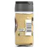 A clear glass jar of Schwartz Ground White Pepper 34G shows the fine tan powder inside along with recycling information and storage instructions on the label.