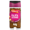 A clear glass jar of Schwartz Fajita Seasoning 46G is shown, featuring a vibrant pink label and a magenta and black cap, against a white background.
