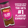 A bottle of Schwartz Cajun Seasoning 44G is displayed against a vibrant purple background with text highlighting the brand as the UK number one flavour experts.