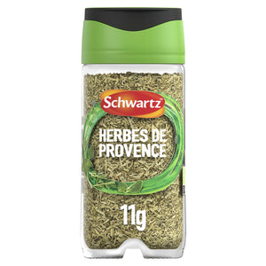 A clear glass jar of Schwartz Herbes De Provence, 11G featuring a green lid and a label showing a blend of dried herbs.