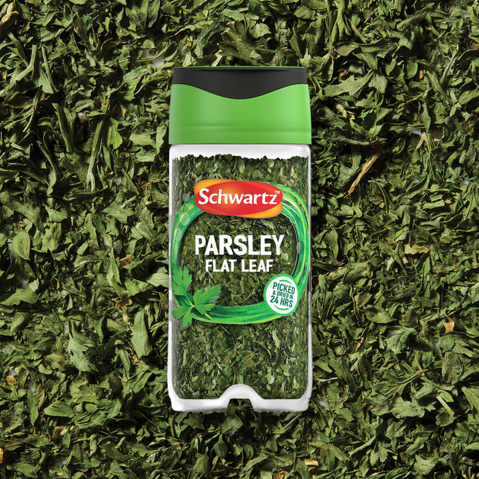 A clear jar of Schwartz Parsley, 3G is shown against a background of the dried green herb.