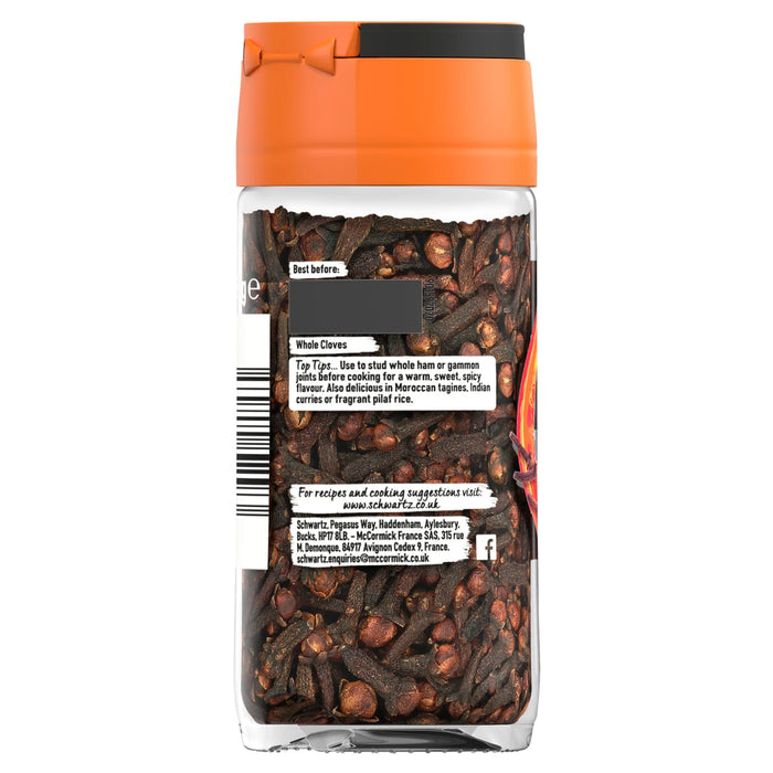 The back of a clear glass Schwartz Whole Cloves 22G Jar, showing the product label with cooking tips and company contact information.