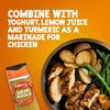 A bottle of Schwartz Garam Masala, 30G is displayed next to a finished dish of marinated chicken, roasted potatoes, and green beans, illustrating a serving suggestion.